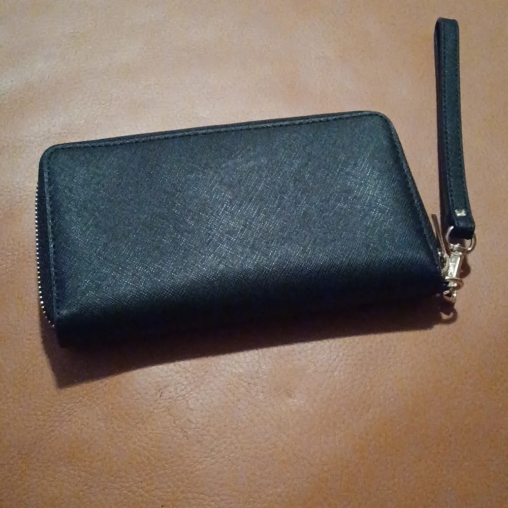 > Michael Kors Black Wristlet with Gold Accents